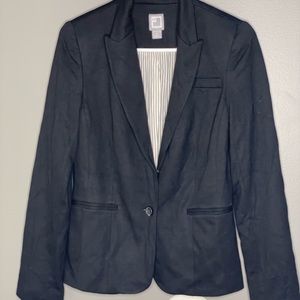 Black blazer with subtle shoulder pads